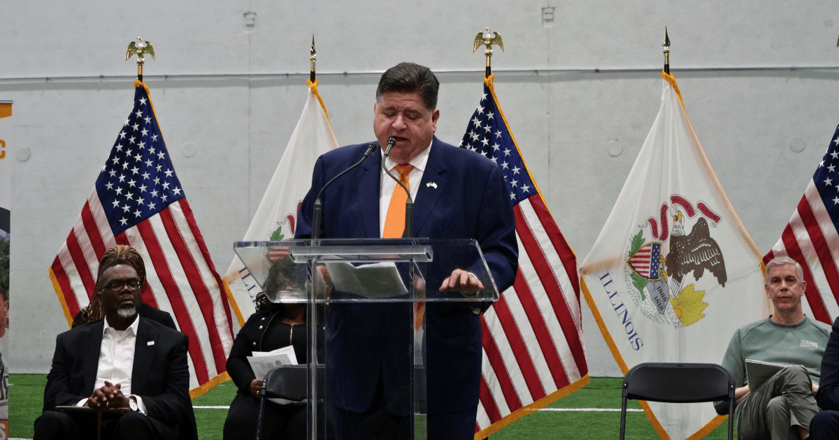 Governor J.B. Pritzker addresses the crowd at the Pullman Community Center on Thursday, April 17, 2025, for a press conference celebrating a recent report on the effectiveness of the Peacekeepers Program.